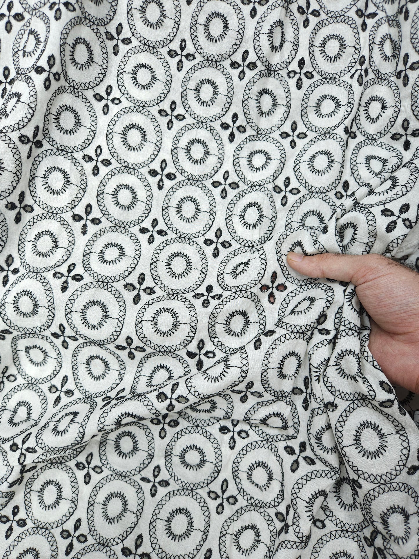 Black on white 100% cotton fabric with Schifli work