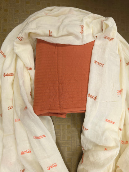 Designer Dusty Orange Cotton Suit Set with Woven City Name Cotton Dupatta