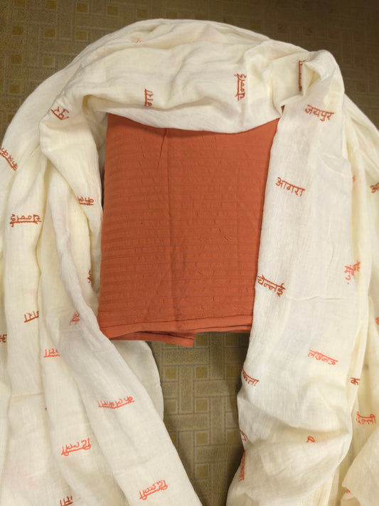 Designer Dusty Orange Cotton Suit Set with Woven City Name Cotton Dupatta