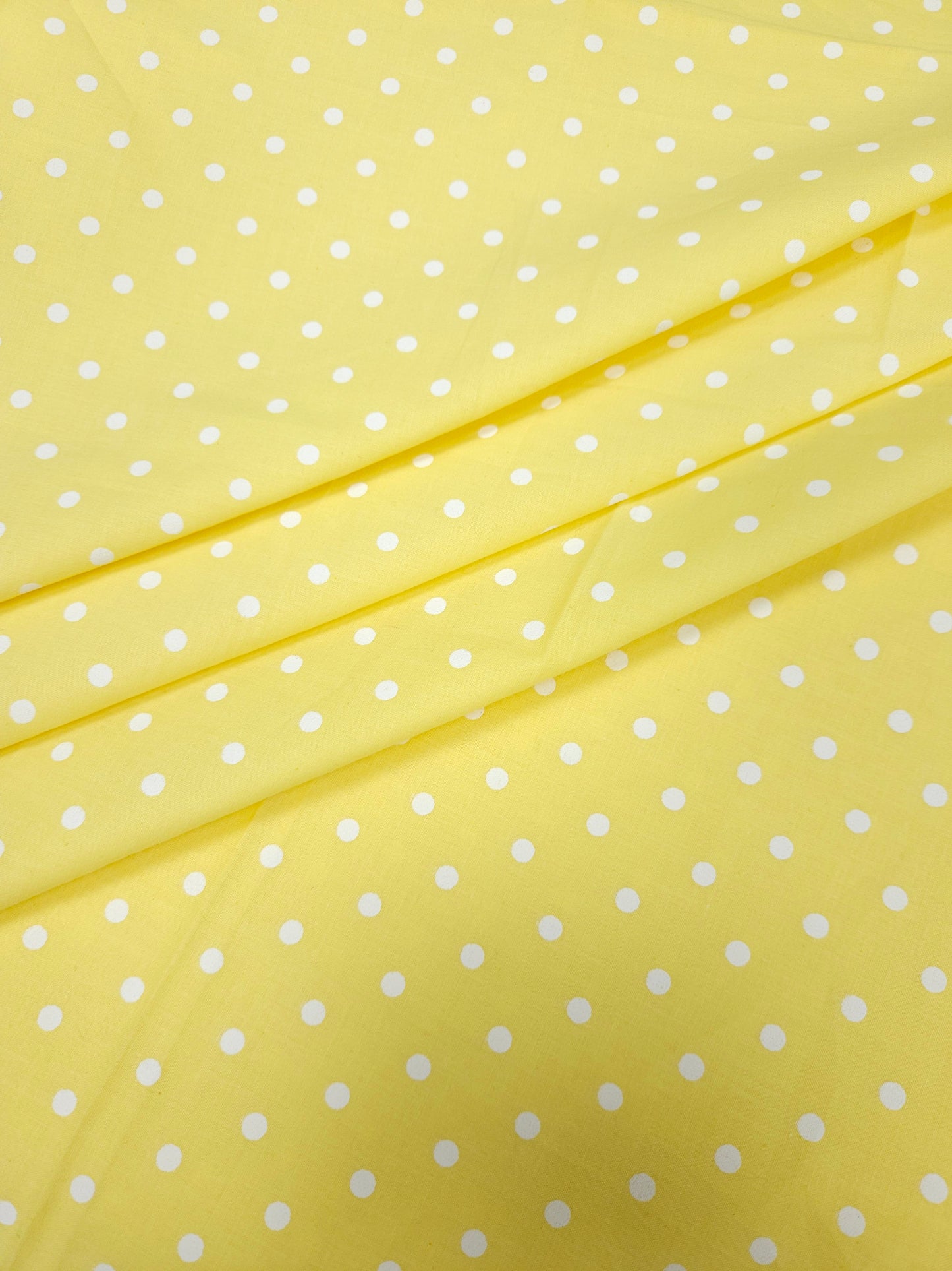 Yellow Cambric Cotton Fabric with White Polka Dot Print