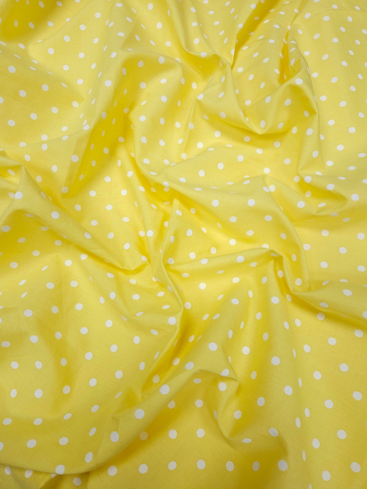 Yellow Cambric Cotton Fabric with White Polka Dot Print